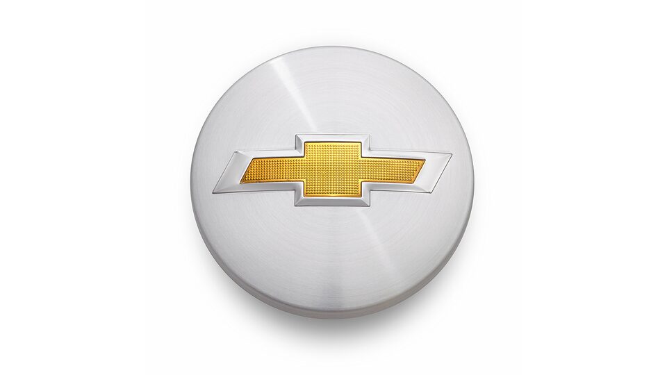 Centro de rin de color cromo con logo Chevrolet
